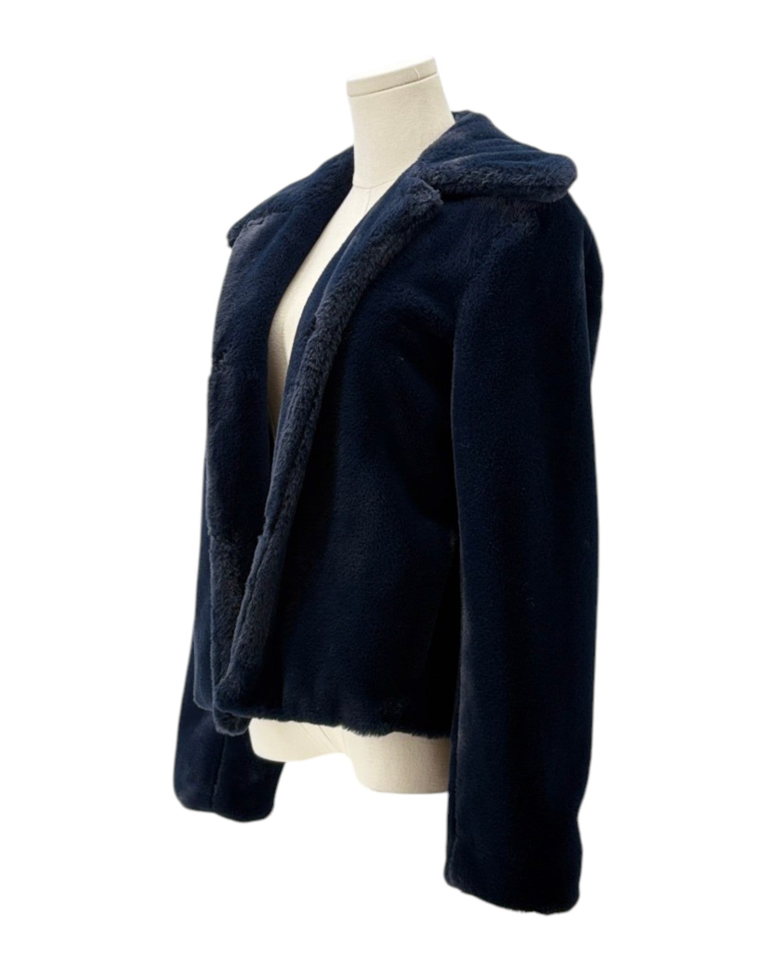 Navy blue fleece jacket on a mannequin against a white background