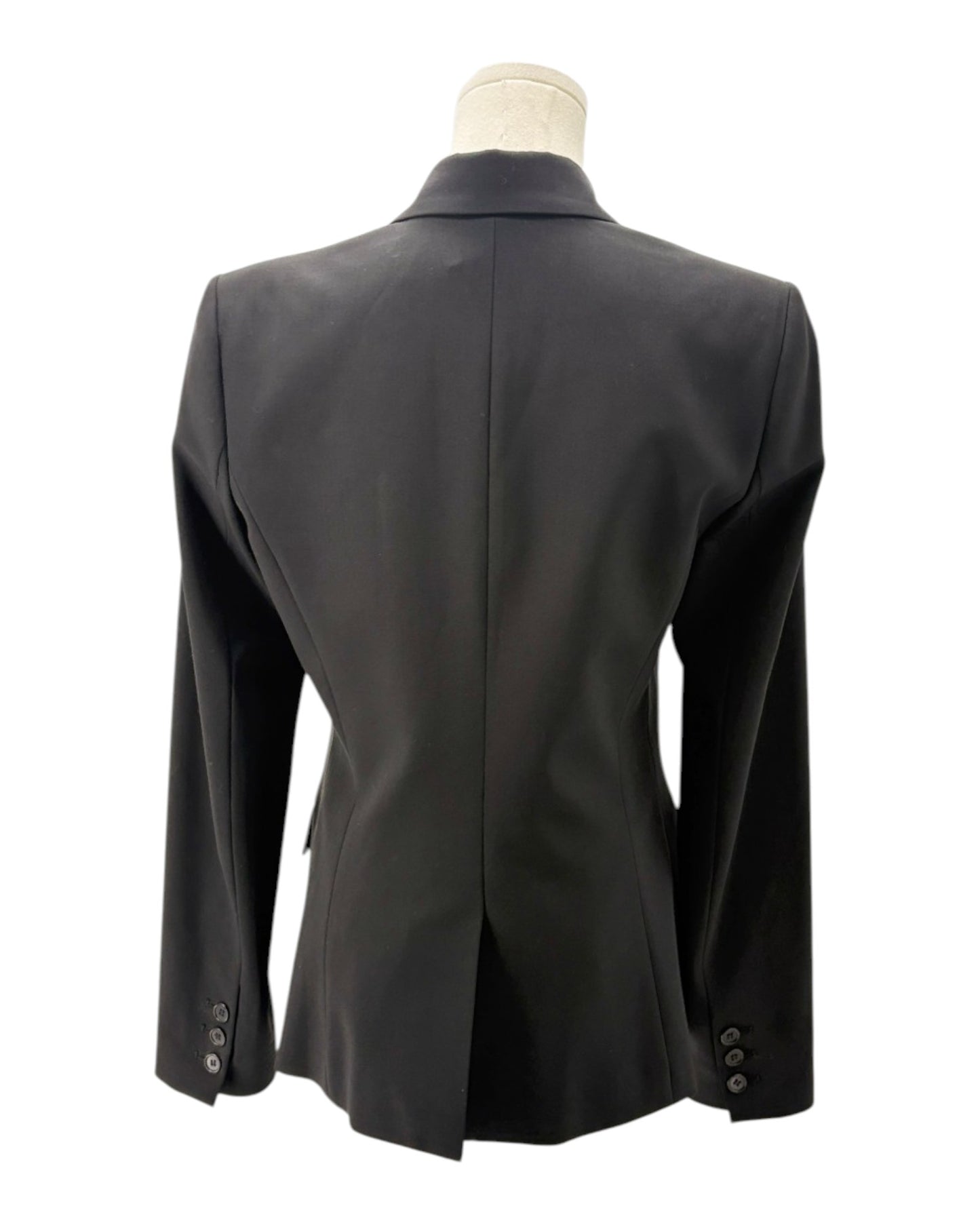 Black blazer on a mannequin against a white background