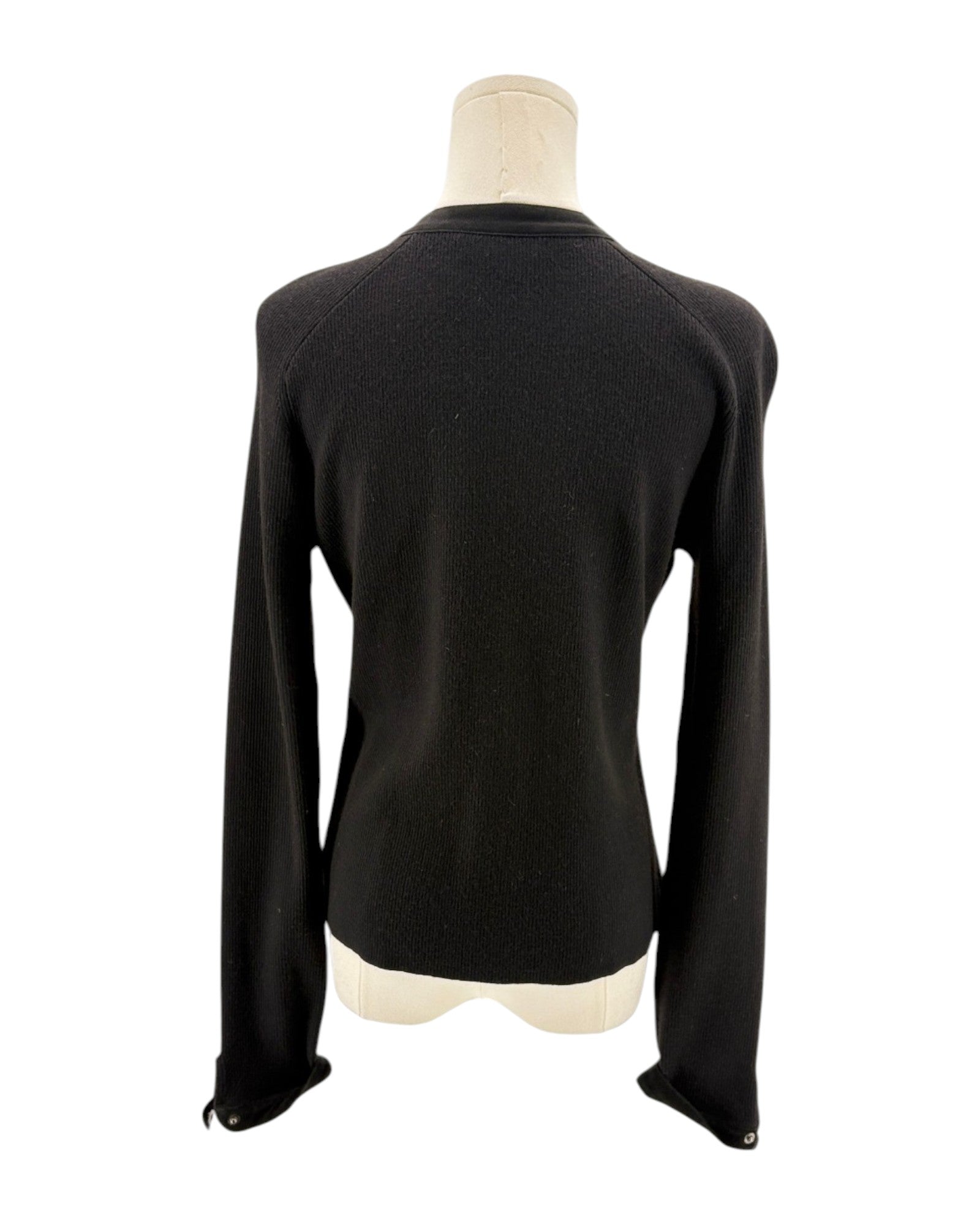 Black long sleeve jacket on mannequin on white background