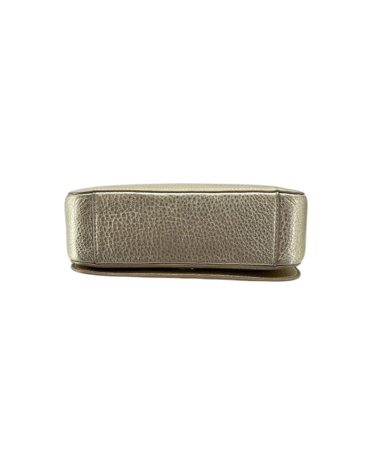 Metallic silver money clip on a white background