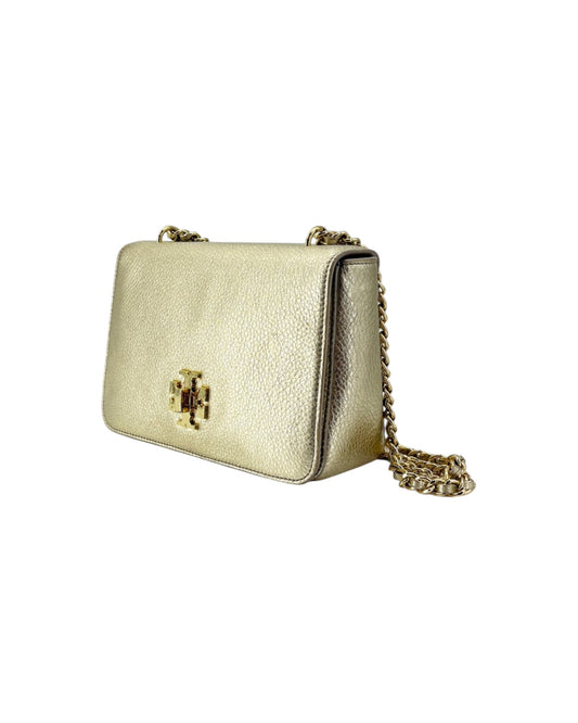 Gold handbag with a chain strap on a white background