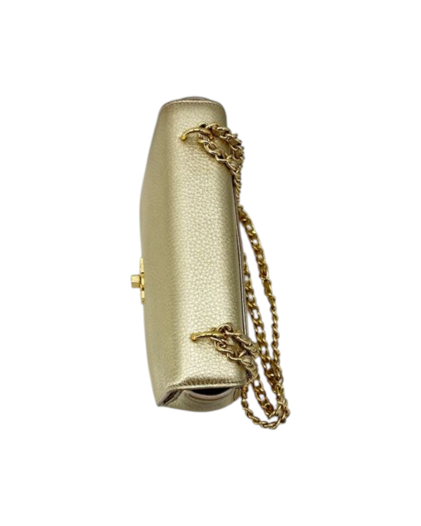 Gold metallic clutch bag with a chain strap on a white background