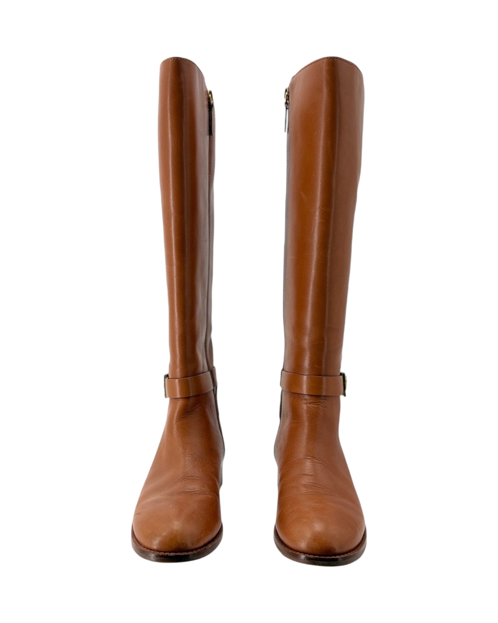 Pair of brown knee-high boots on a white background