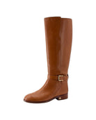 Brown leather knee-high boot with a gold buckle on a white background