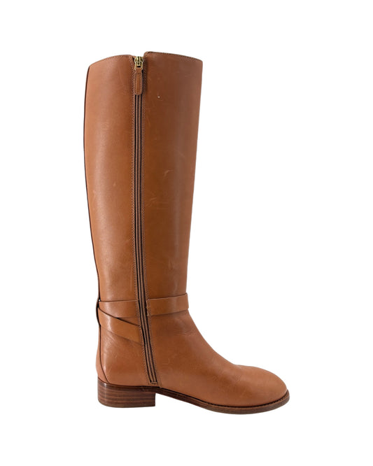 Brown leather knee-high boot on a white background