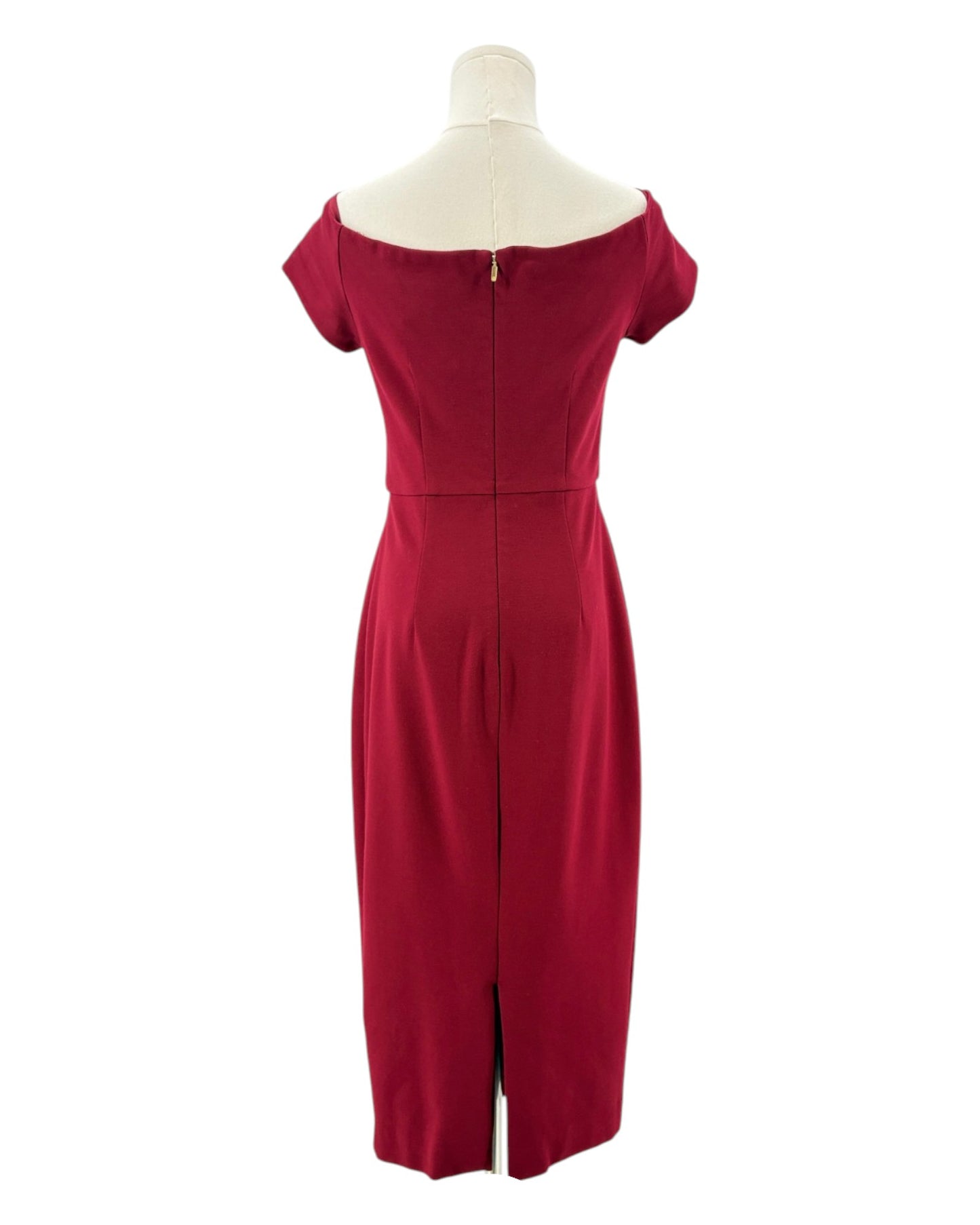 Trina Turk maroon red dress on a mannequin against a white background
