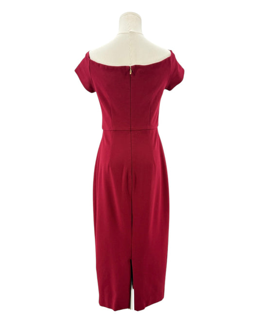 Trina Turk maroon red dress on a mannequin against a white background