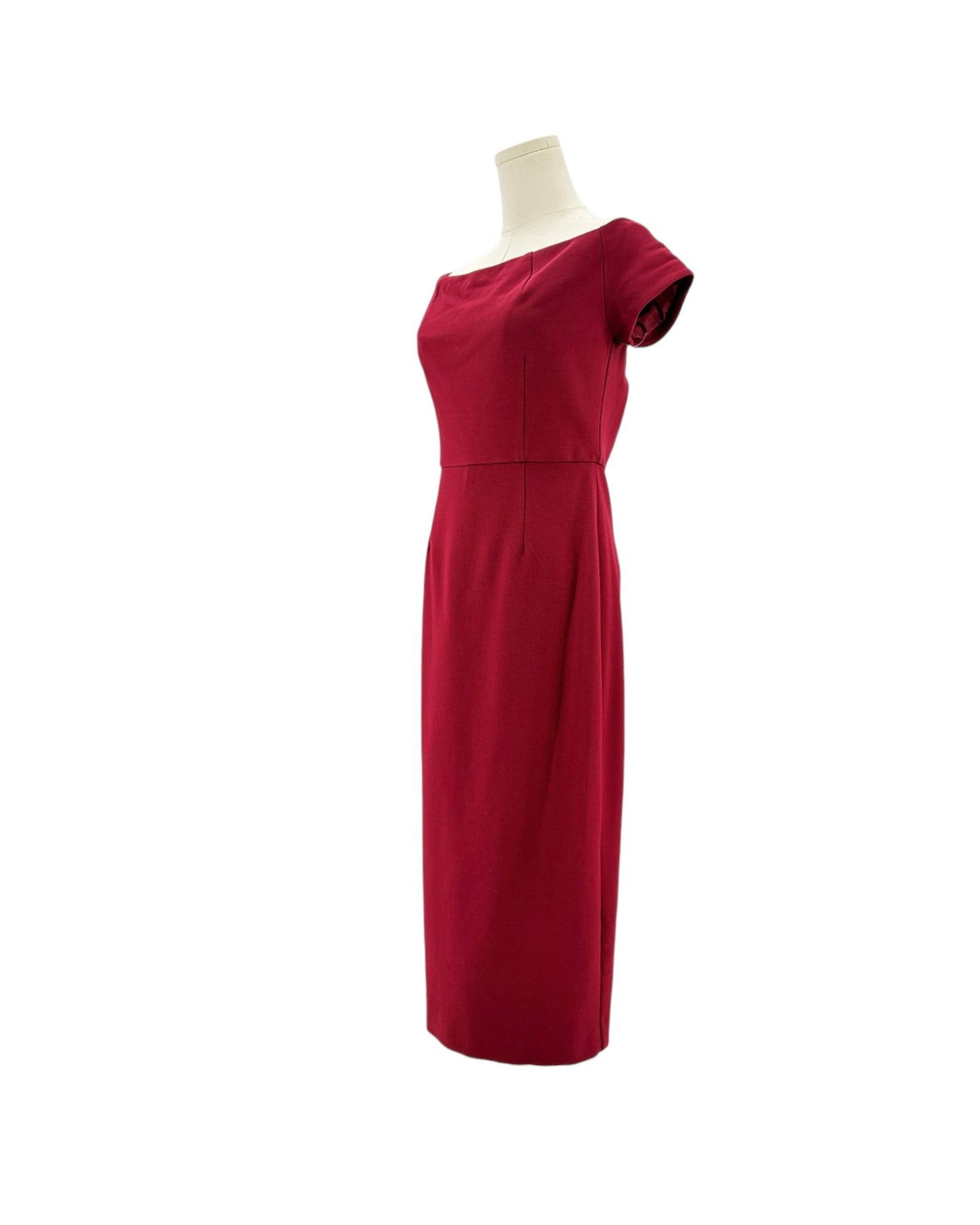 Trina Turk maroon red dress on a mannequin against a white background