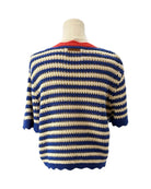 Blue and white striped sweater on a mannequin against a white background