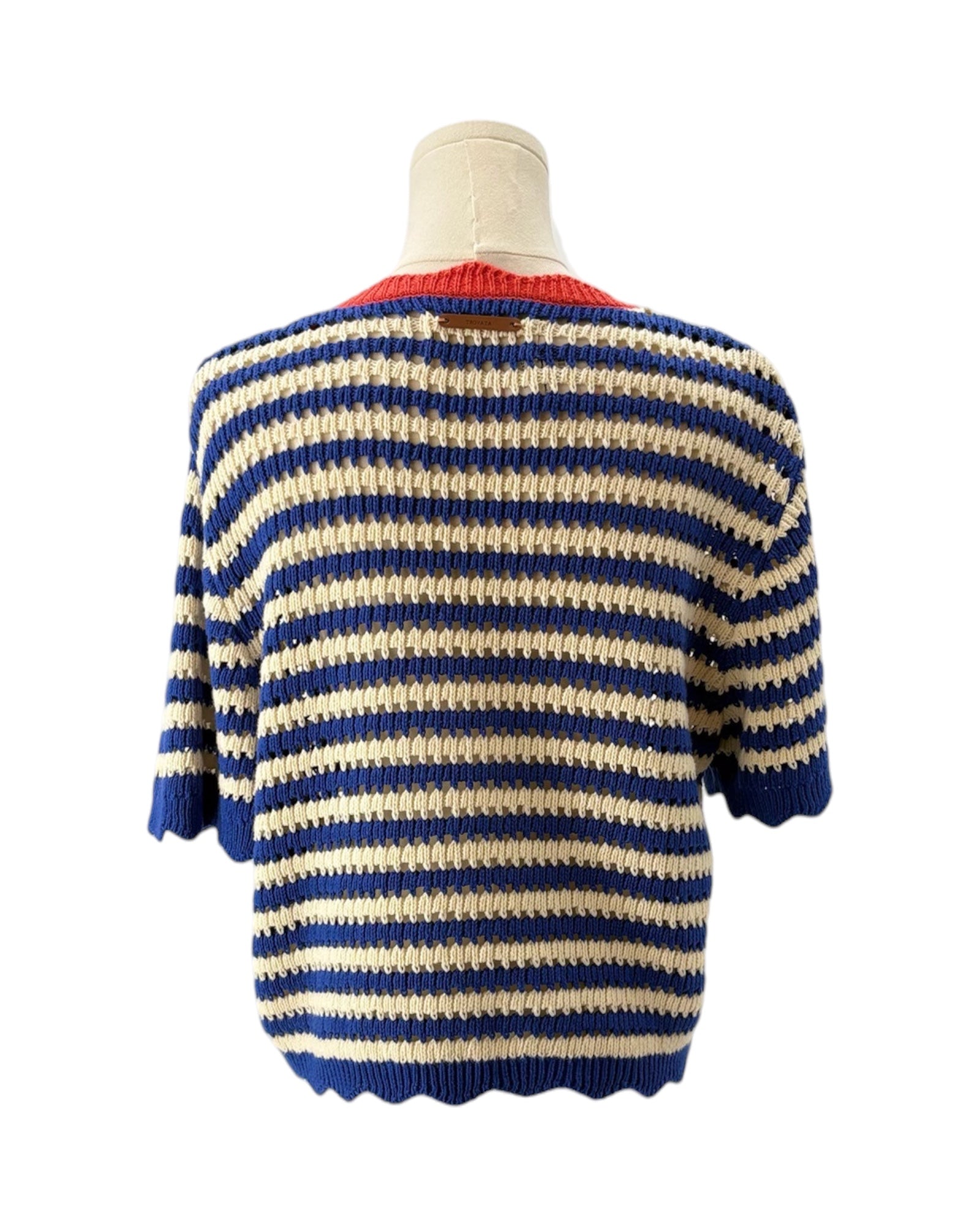 Blue and white striped sweater on a mannequin against a white background