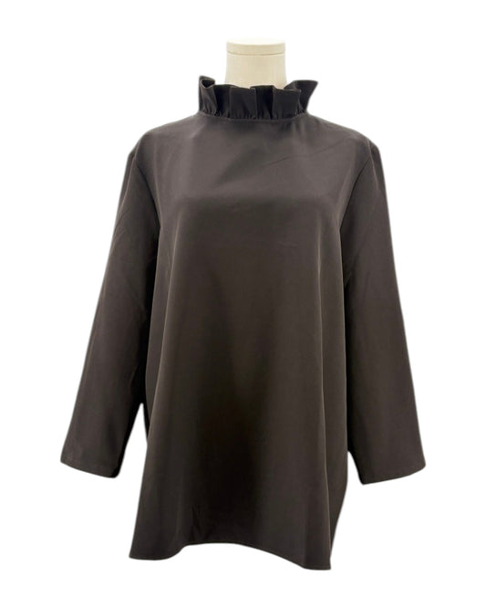 Tuckernuck black blouse with ruffle collar and a bow neckline on a mannequin against a white background