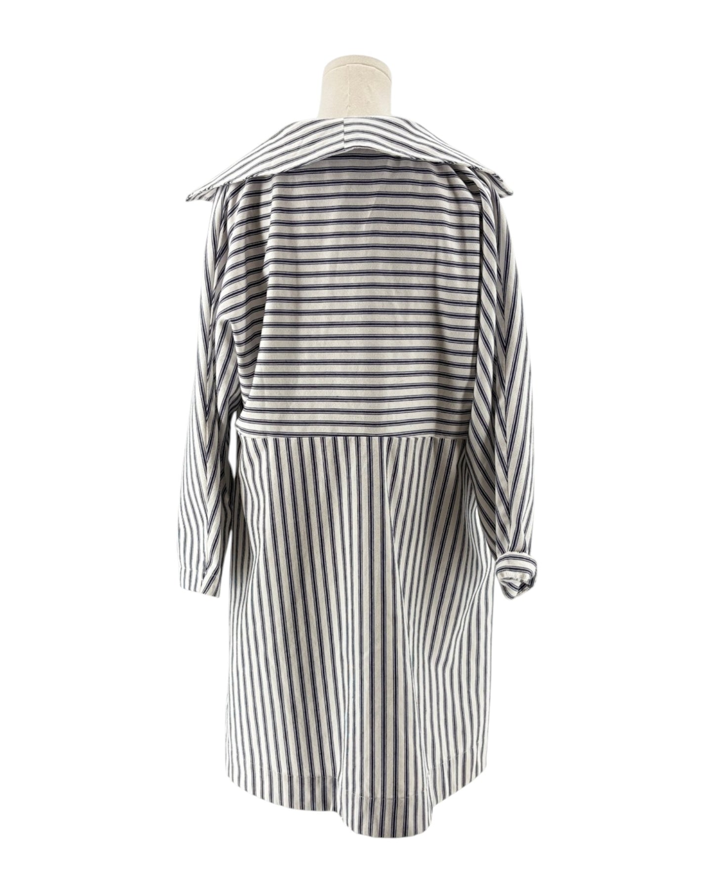 Striped mini dress on mannequin on a white background