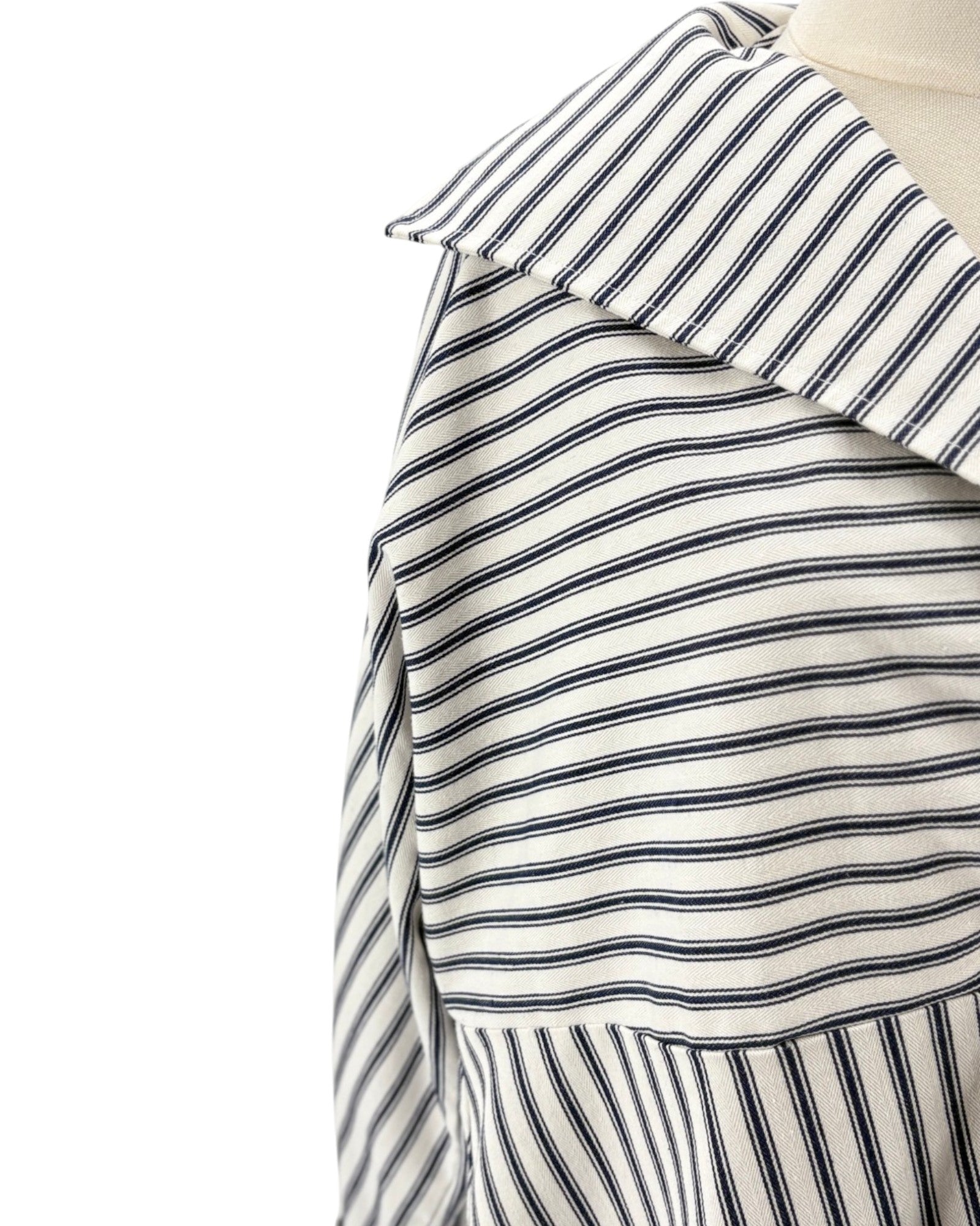 Striped mini dress on mannequin on a white background