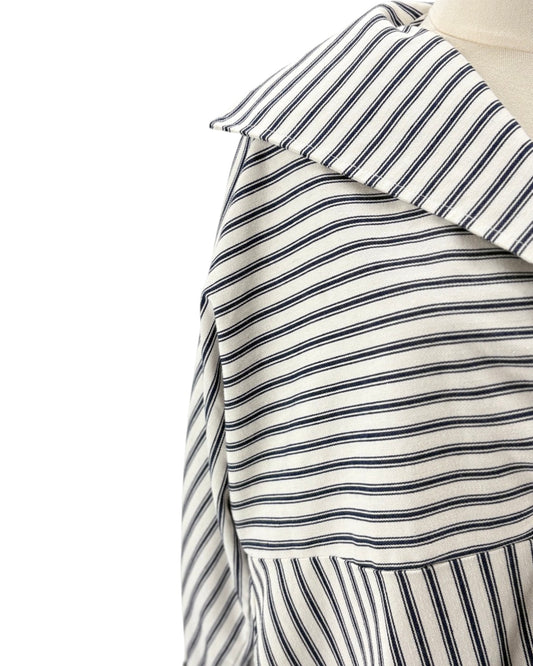 Striped mini dress on mannequin on a white background
