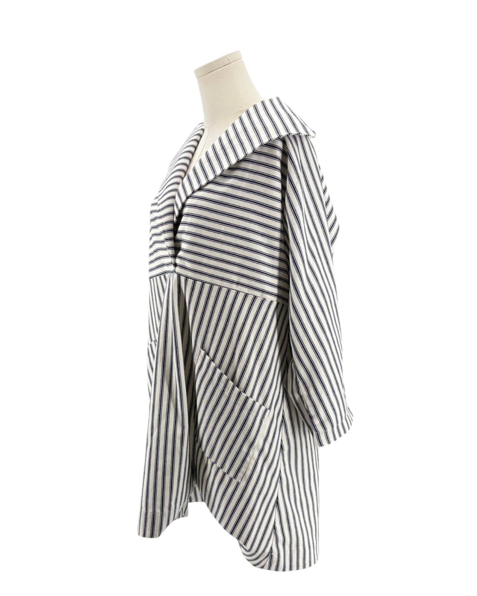 Striped mini dress on mannequin on a white background