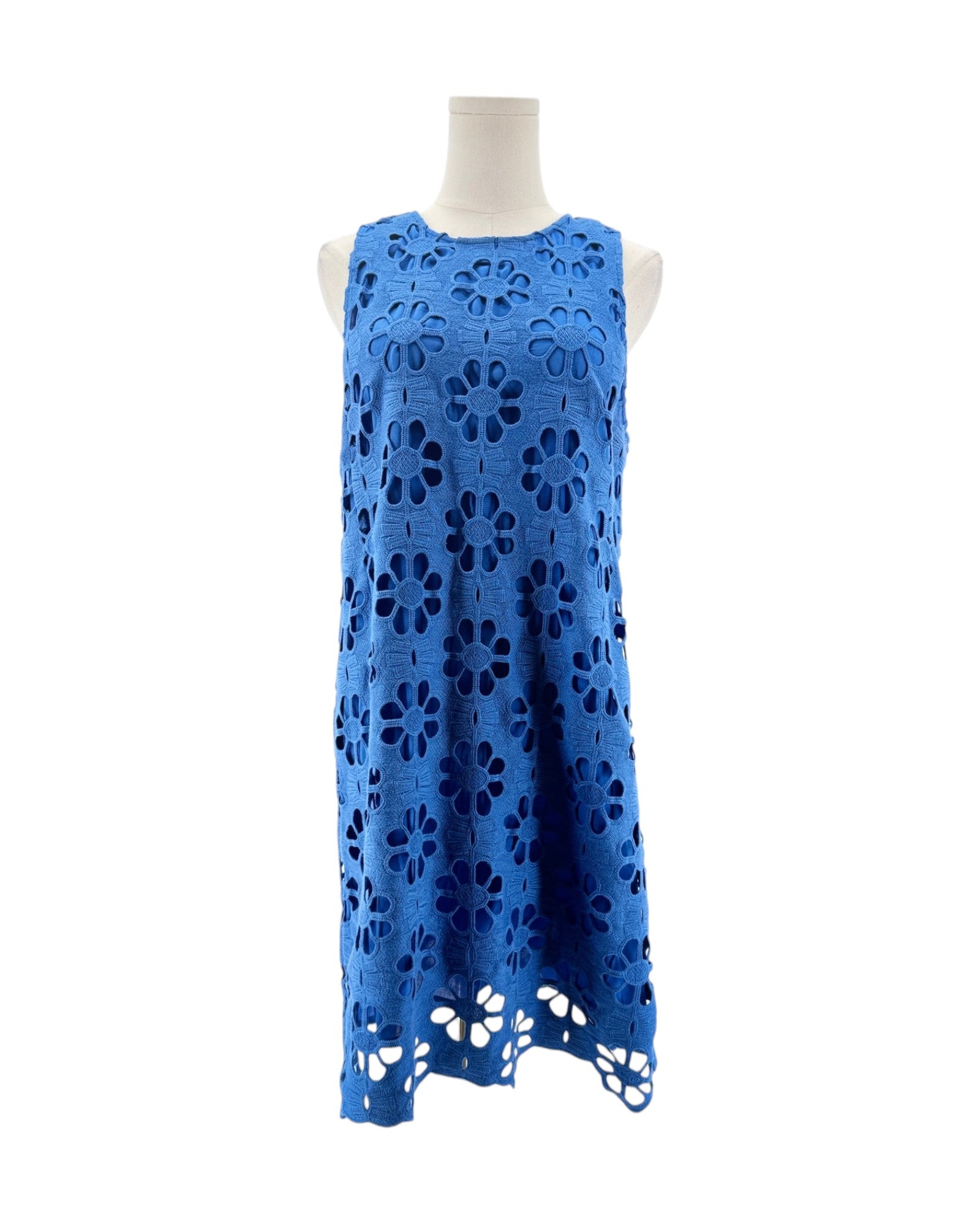 Blue lace dress on a mannequin against a white background