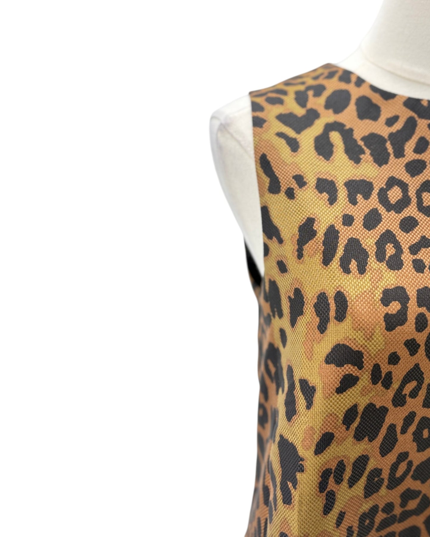 A sleeveless leopard print vest or top displayed on a white mannequin torso against a plain white background.