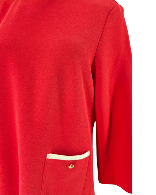 Red Shift silhouette, structural double patch pockets with white contrast piping, gold button accents, 3/4 sleeves on a mannequin on a white background
