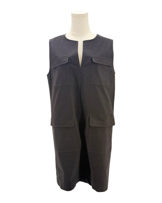 Black sleeveless mini dress on a mannequin on a white background