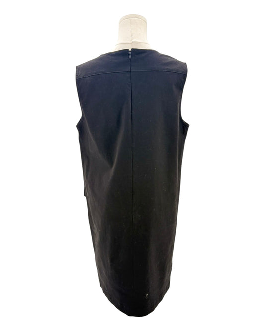 Black sleeveless mini dress on a mannequin on a white background