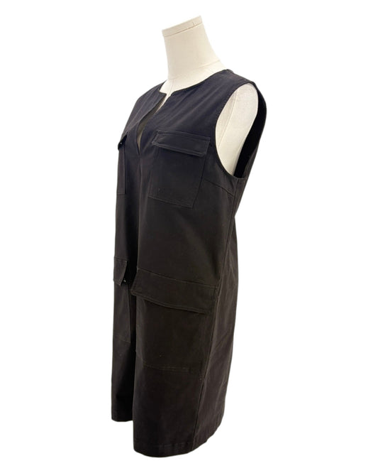 Black sleeveless mini dress on a mannequin on a white background