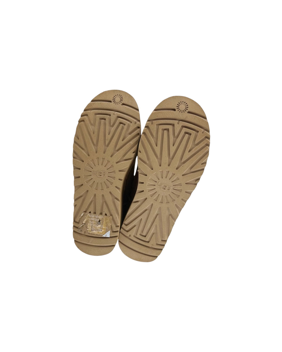 Brown shoes soles that say UGG