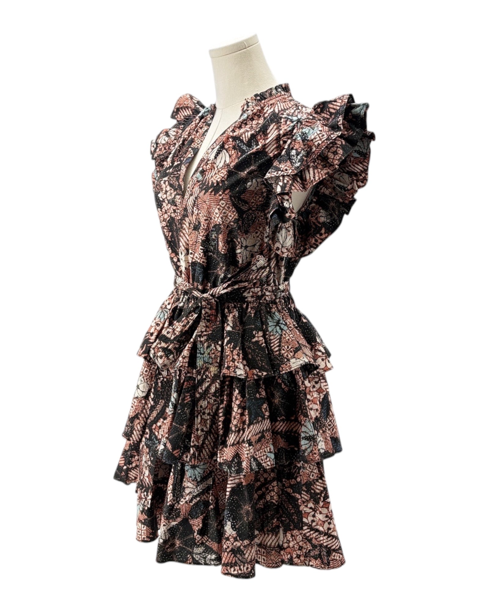 Floral patterned dress on a mannequin against a white background