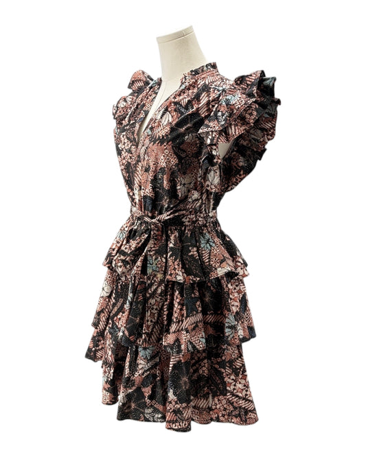 Floral patterned dress on a mannequin against a white background
