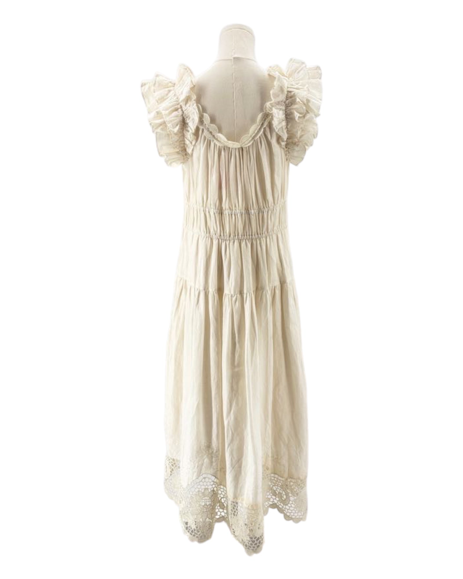 Ulla Johnson cream dress with ruffled sleeves on a mannequin against a white background