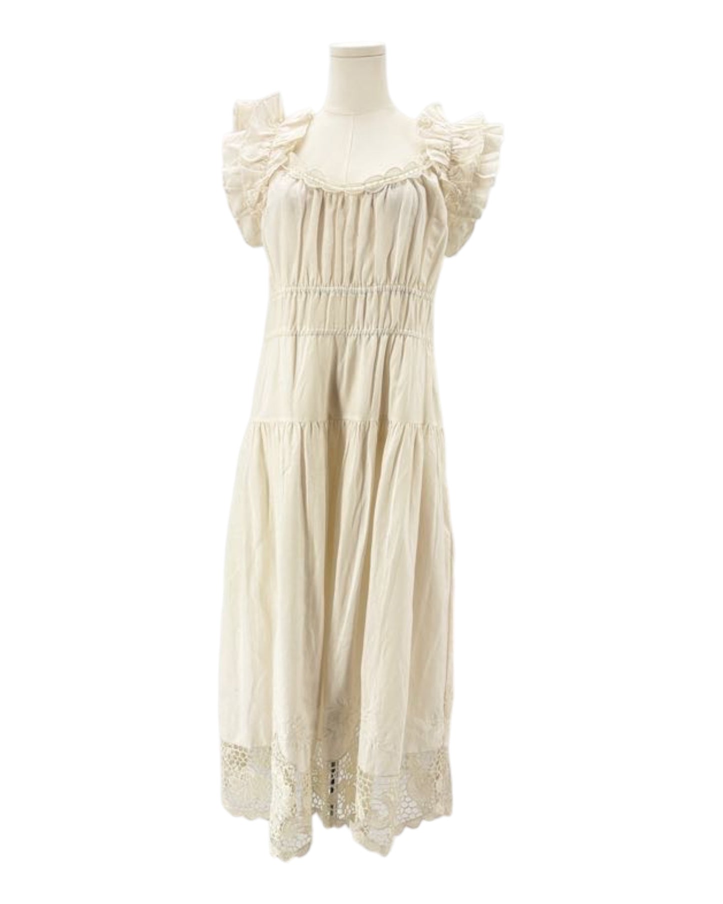 Ulla Johnson cream dress with ruffled sleeves on a mannequin against a white background