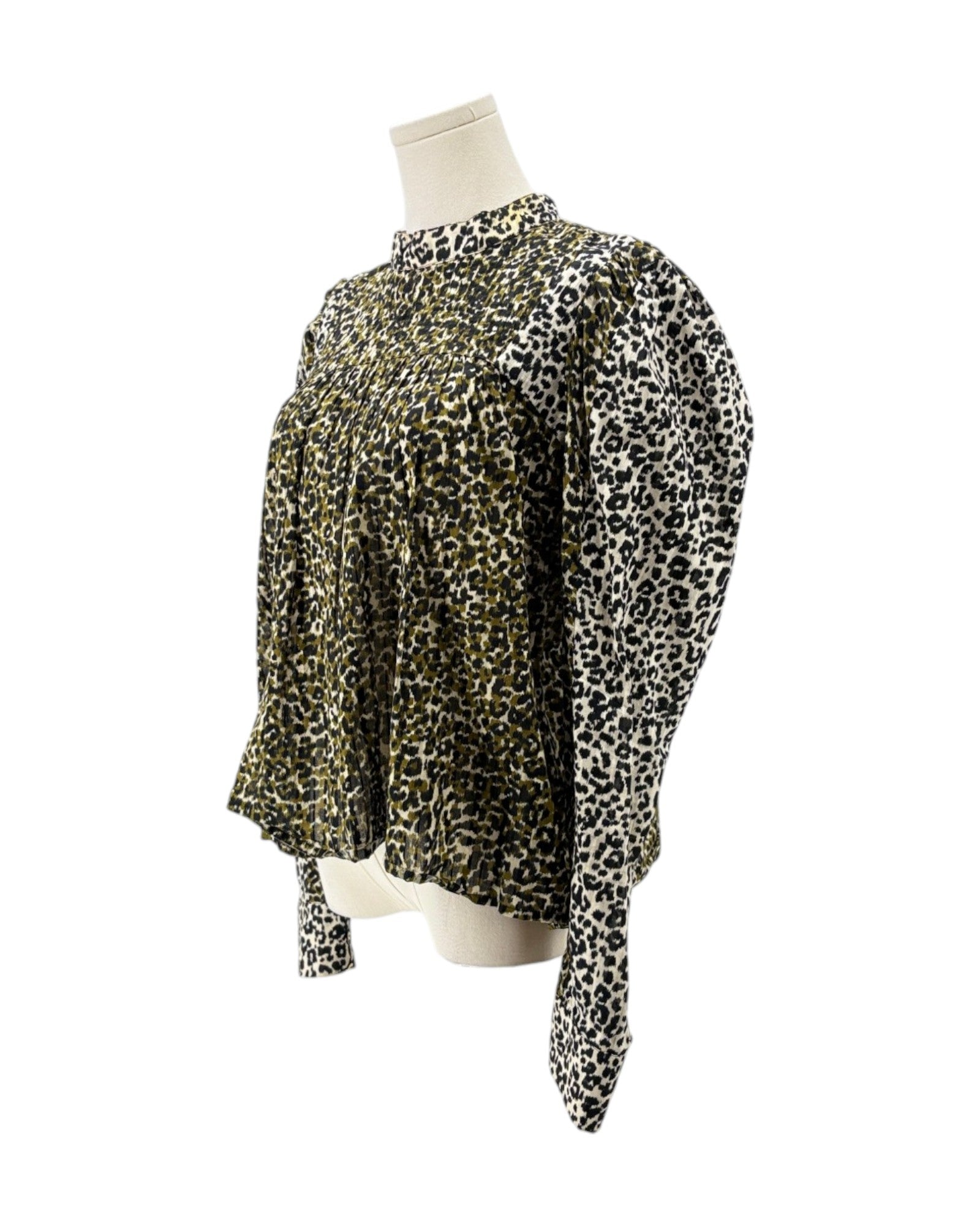 A leopard print long-sleeve blouse displayed on a mannequin torso against a plain white background.