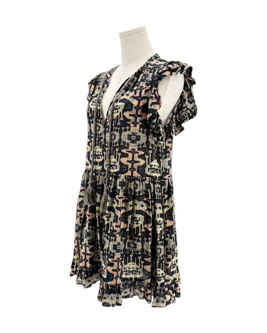 Patterned dress on a mannequin against a white background