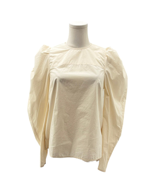 Beige blouse on a mannequin against a white background