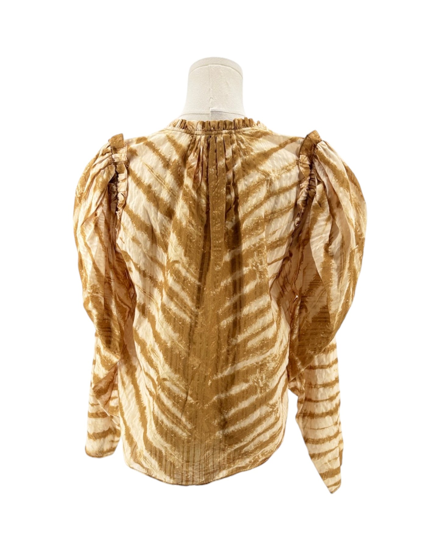 Back view of a patterned blouse on a mannequin against a white background