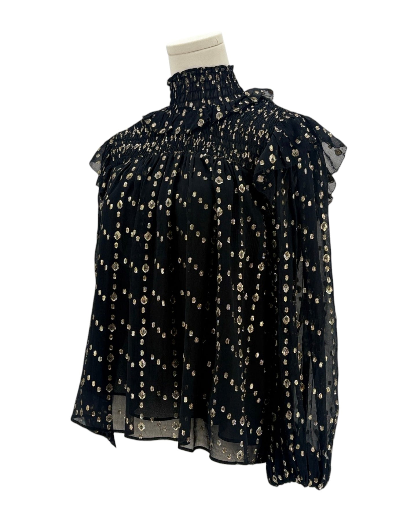 Ulla Johnson black blouse with gold pattern on a mannequin against a white background