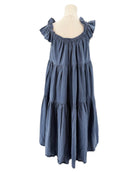 Blue dress on a mannequin against a white background