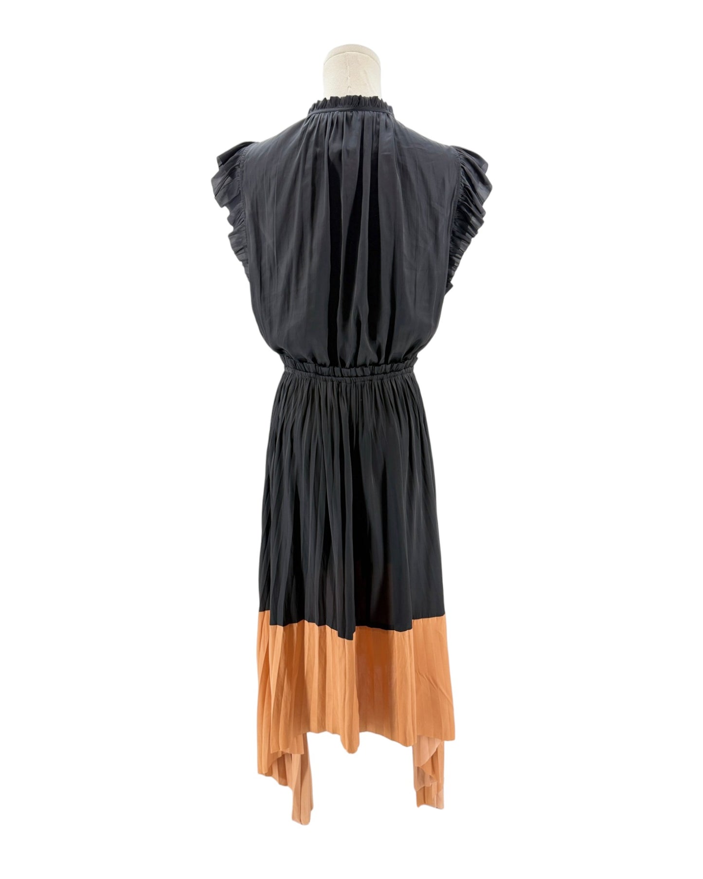 Black and orange dress on a mannequin against a white background