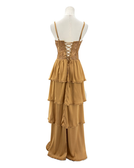 Mustard yellow dress on a mannequin against a white background