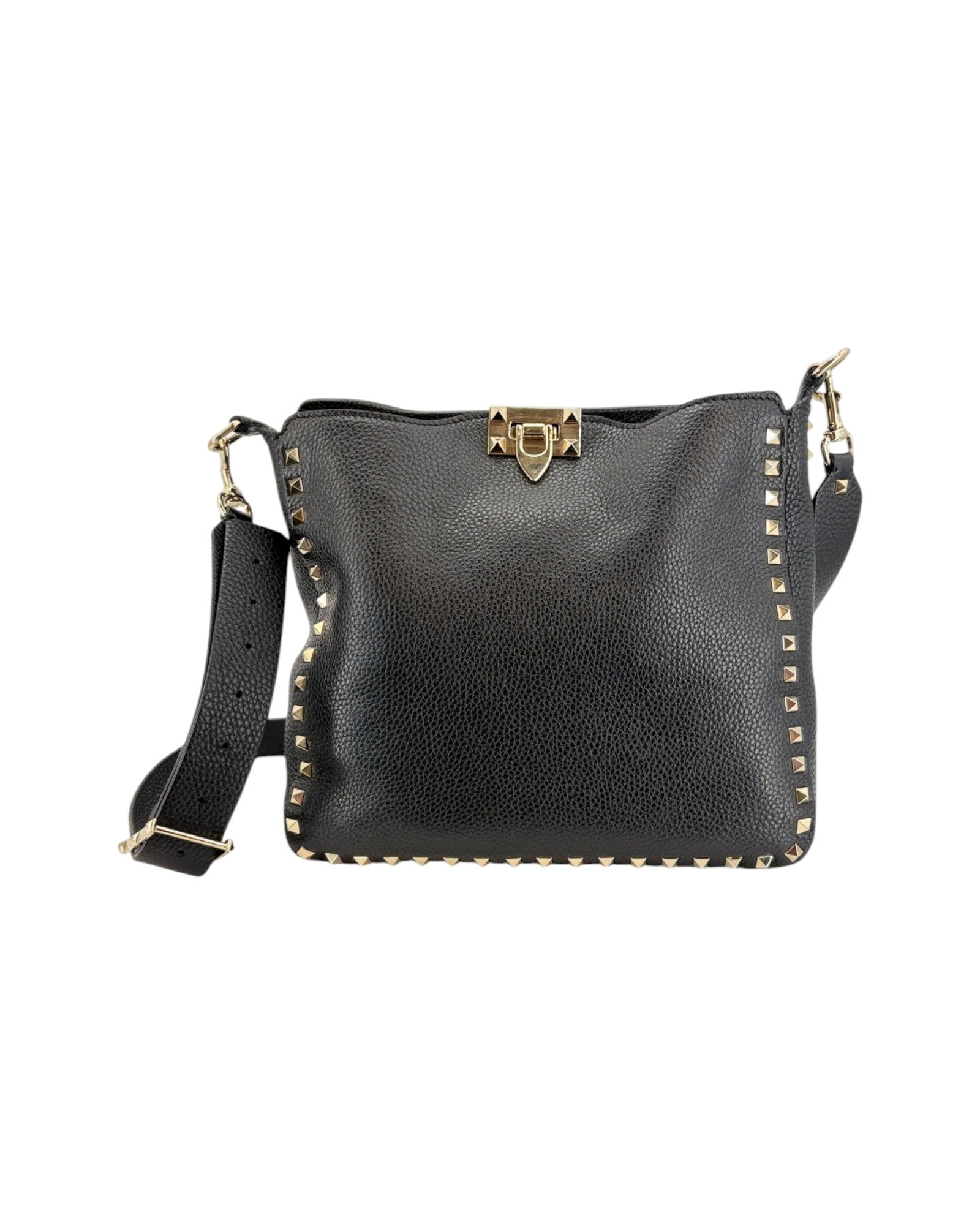 Black leather handbag with gold accents on a white background