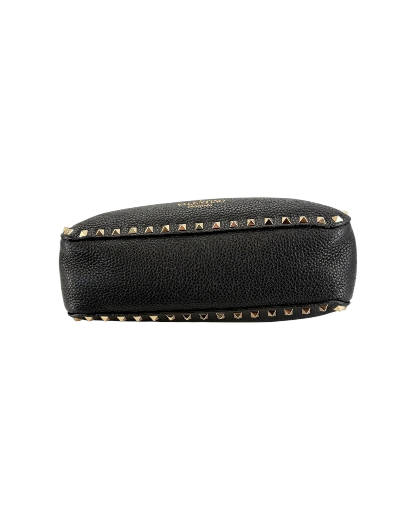 Black leather pouch with gold studs on a white background
