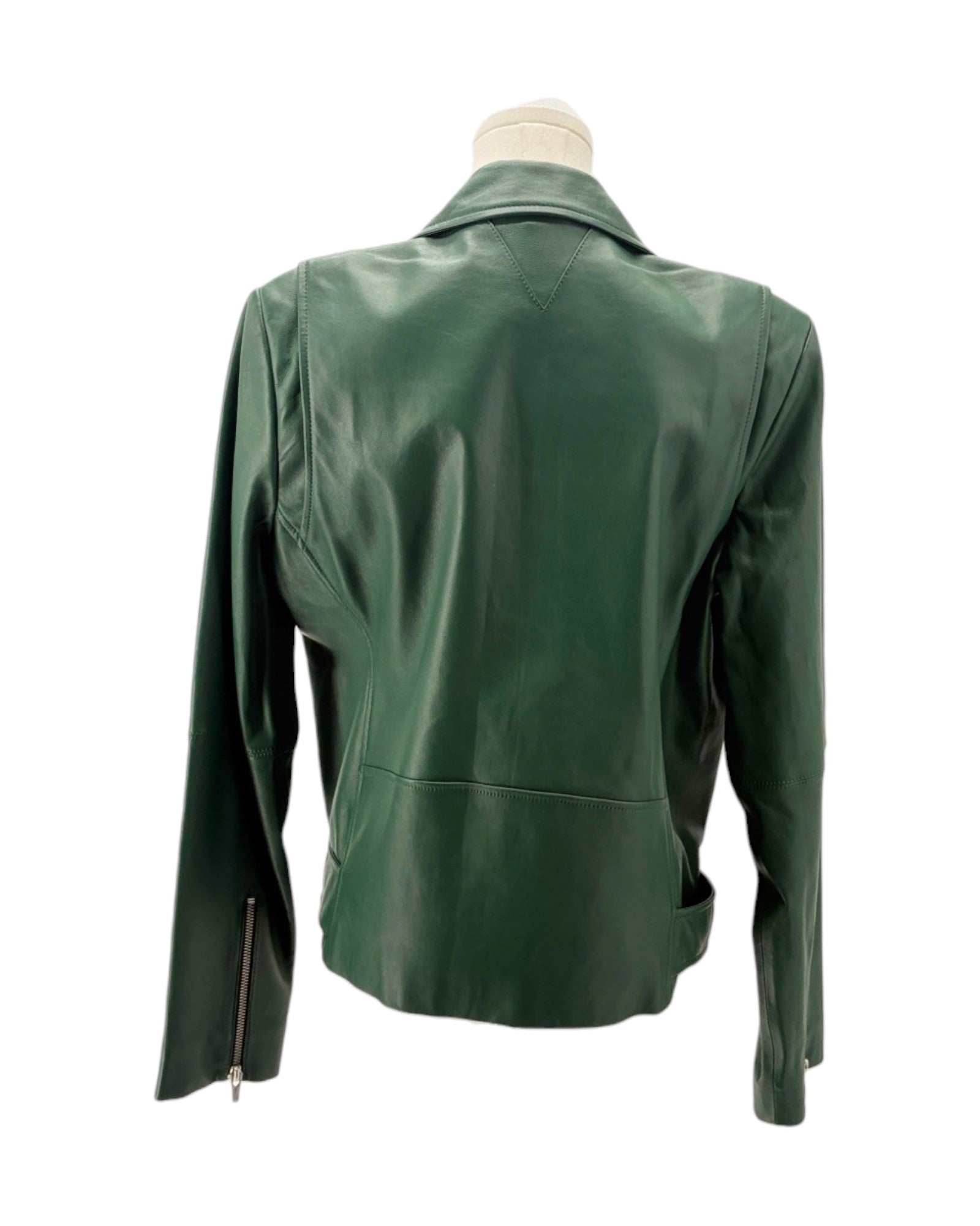 Green leather jacket on a mannequin against a white background