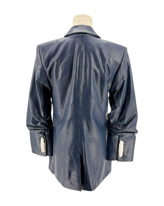 Blue blazer on a mannequin against a white background