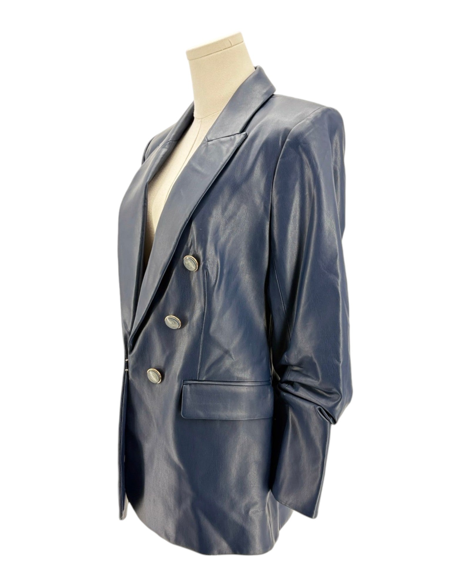 Blue leather blazer on a mannequin against a white background