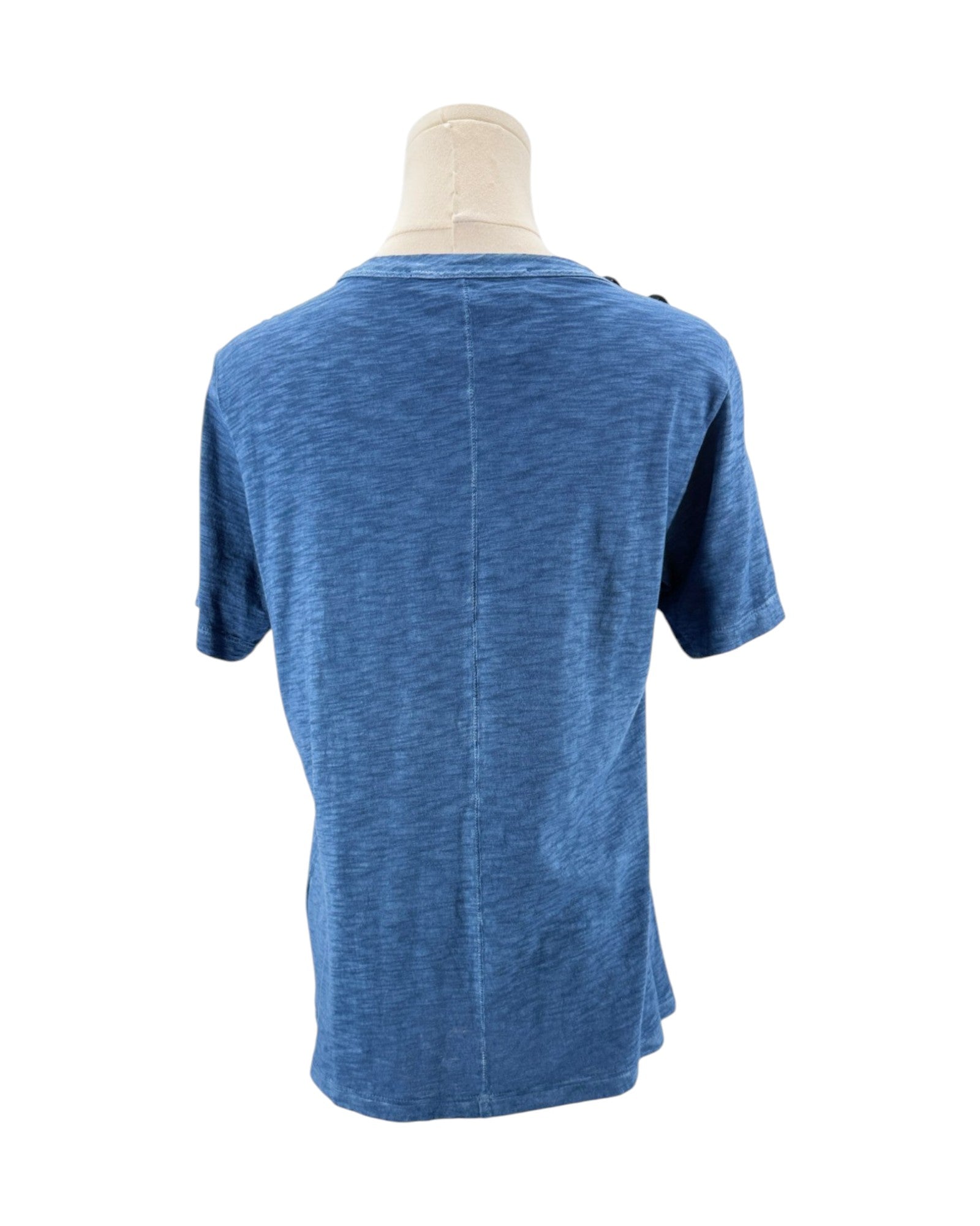 Blue t-shirt on a mannequin with a white background