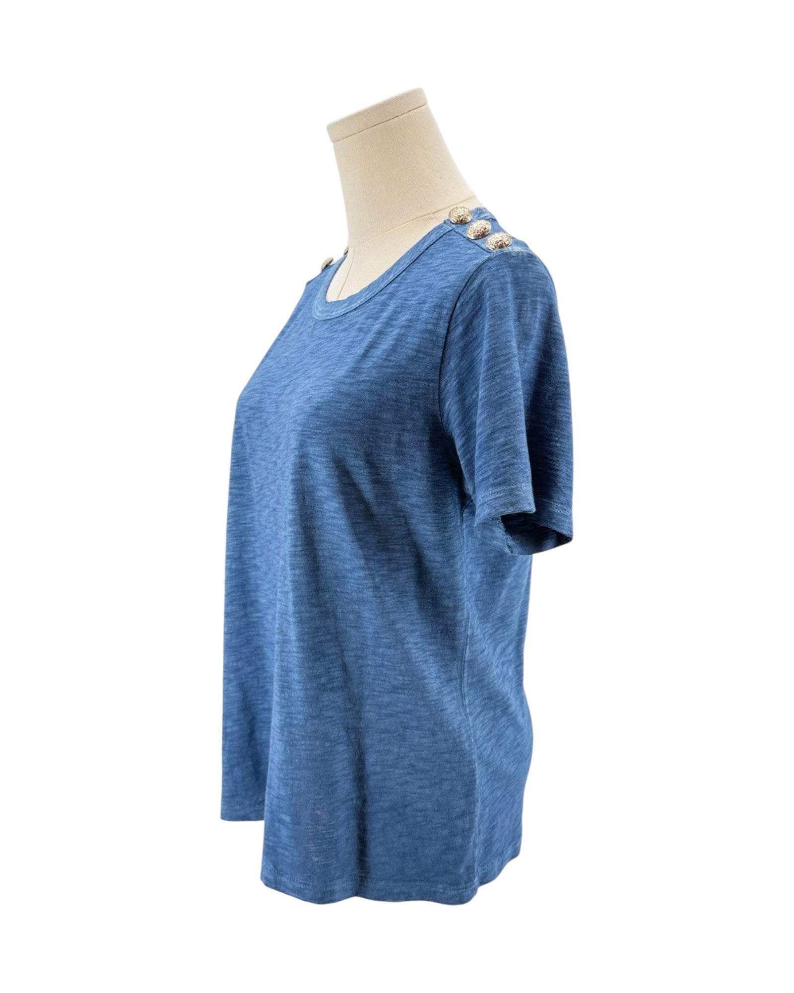 Blue t-shirt on a mannequin against a white background