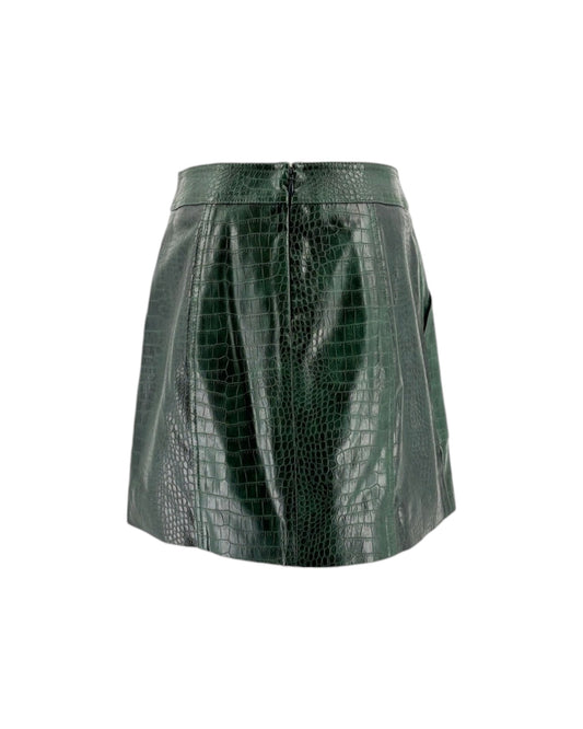 Green crocodile-patterned skirt on a white background