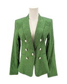 Green blazer with silver buttons on a mannequin against a white background