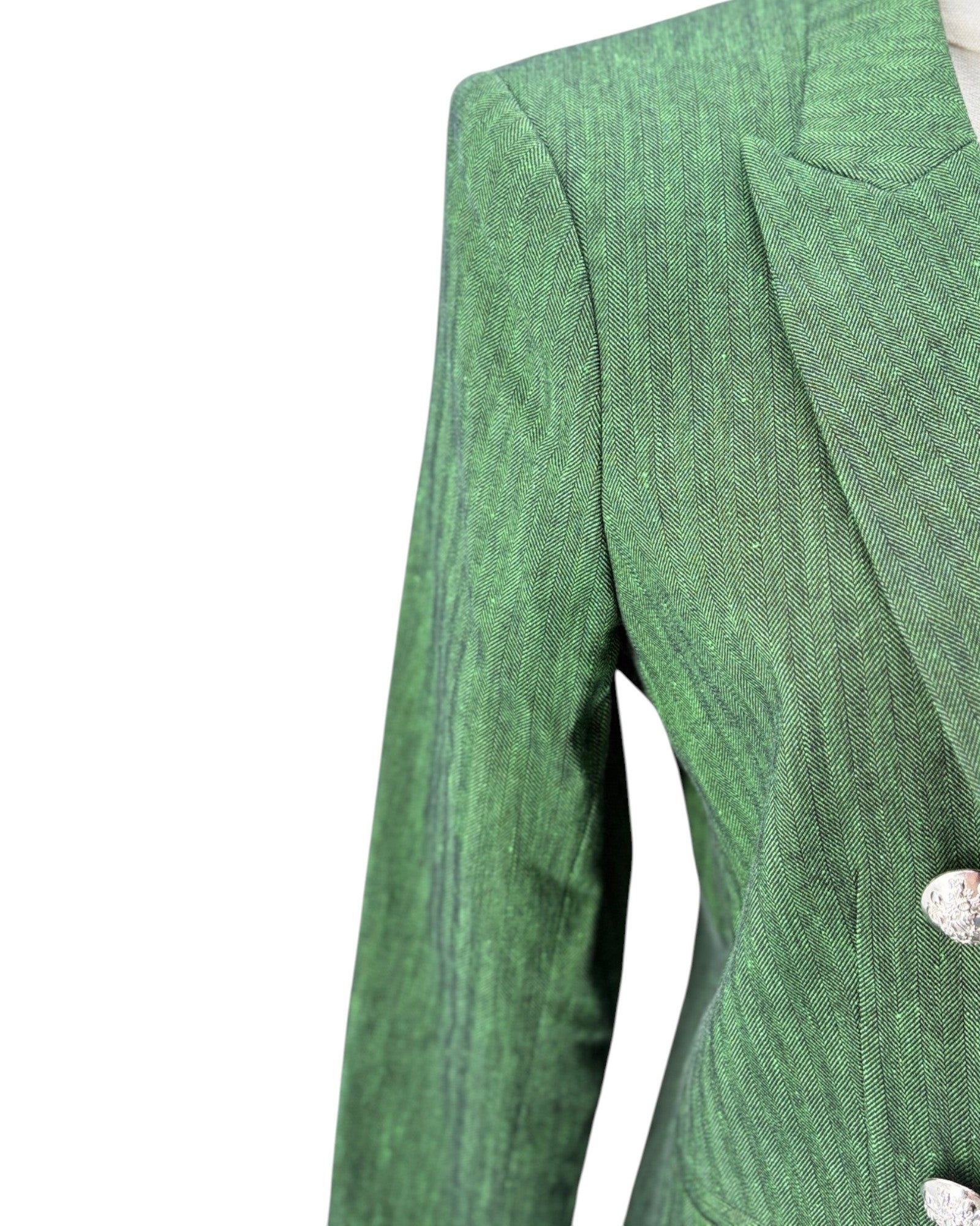 Green textured blazer on a white background