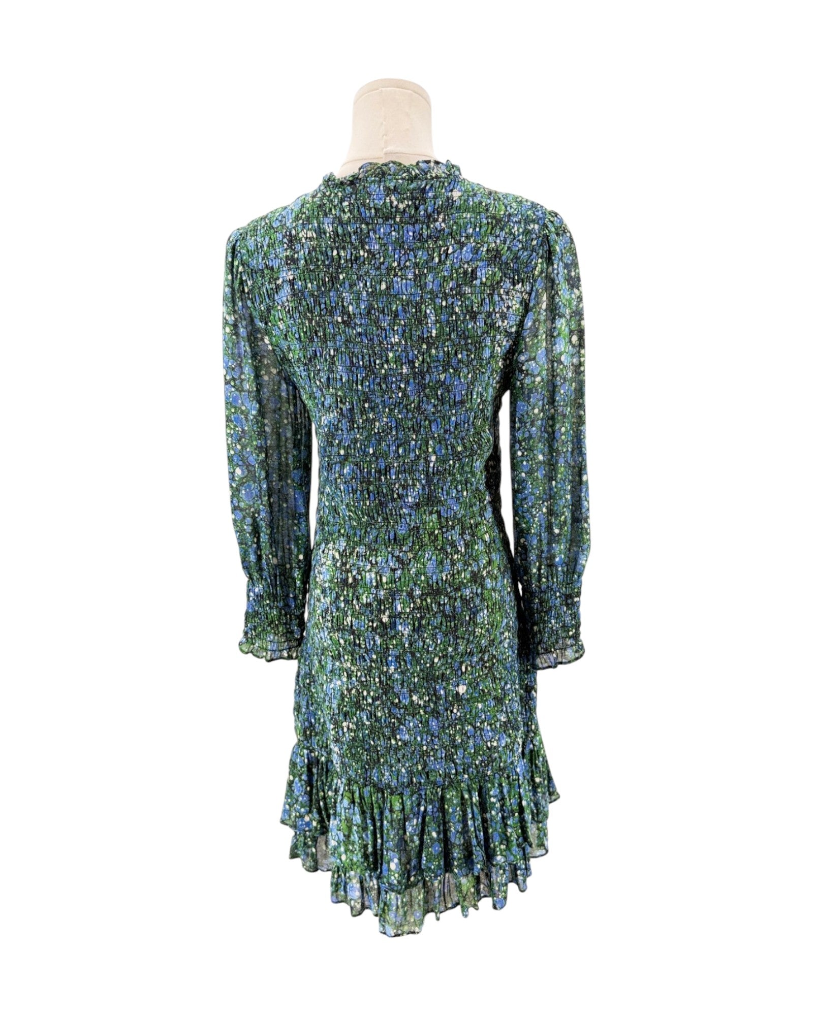 Floral patterned dress on a mannequin against a white background