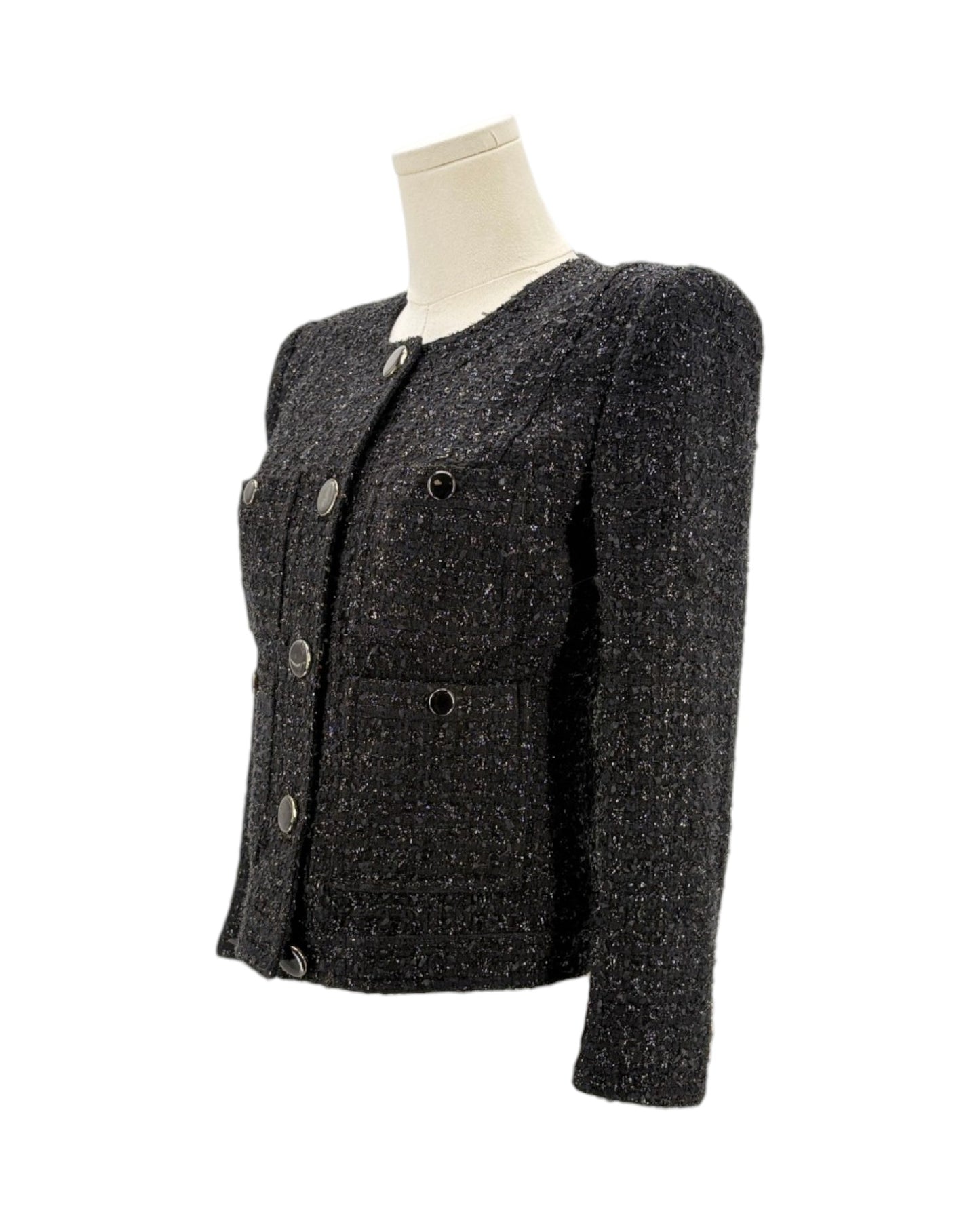 Black textured jacket on a mannequin against a white background